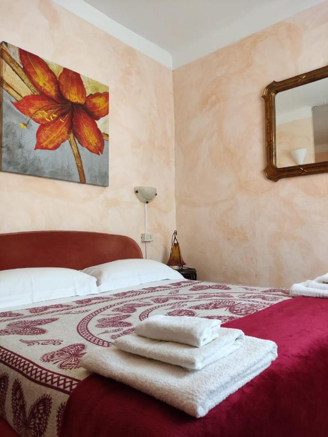 Hotel Glicine Ноли Екстериор снимка